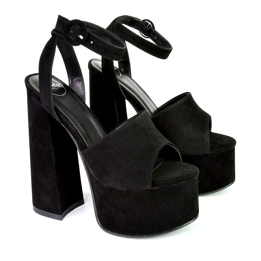 Pennie Strappy Super High Platform Shoes With a Chunky Heel in Fuchsia