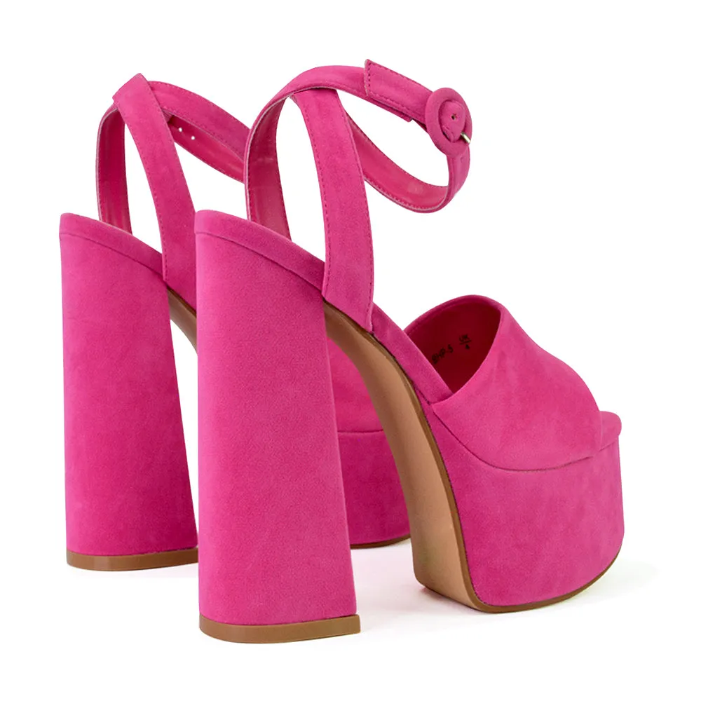 Pennie Strappy Super High Platform Shoes With a Chunky Heel in Fuchsia