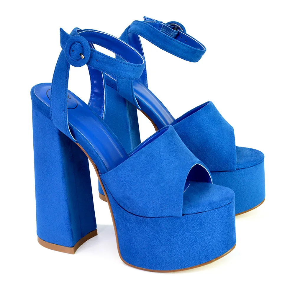 Pennie Strappy Super High Platform Shoes With a Chunky Heel in Fuchsia