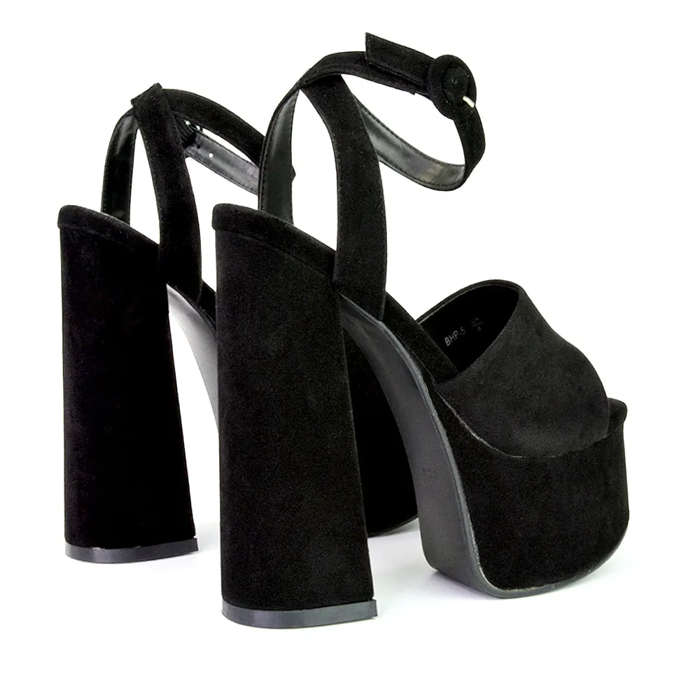 Pennie Strappy Super High Platform Shoes With a Chunky Heel in Fuchsia