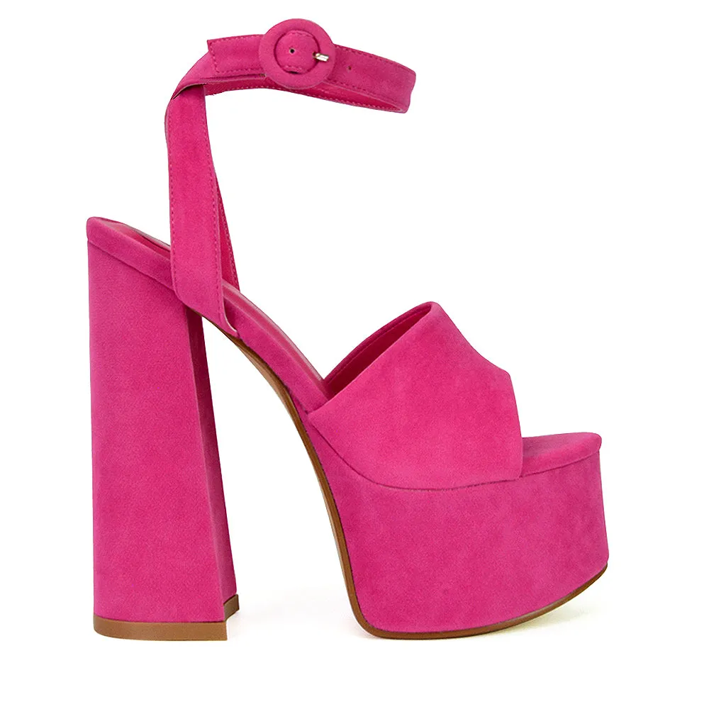 Pennie Strappy Super High Platform Shoes With a Chunky Heel in Fuchsia