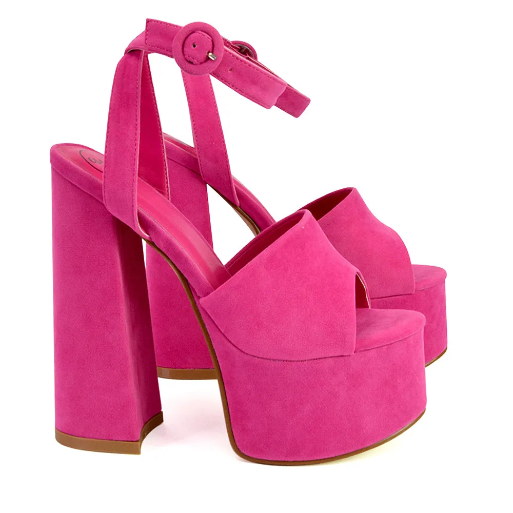 Pennie Strappy Super High Platform Shoes With a Chunky Heel in Fuchsia